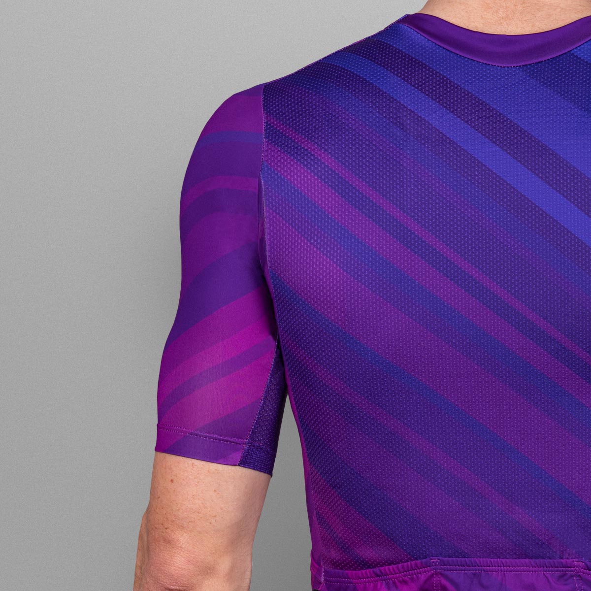 Luxa cycling jersey in pastel purple with contrasting stripes in shades of violet